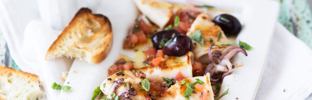 Tintenfische mit Tomaten und Oliven Tintenfische mit Tomaten und Oliven