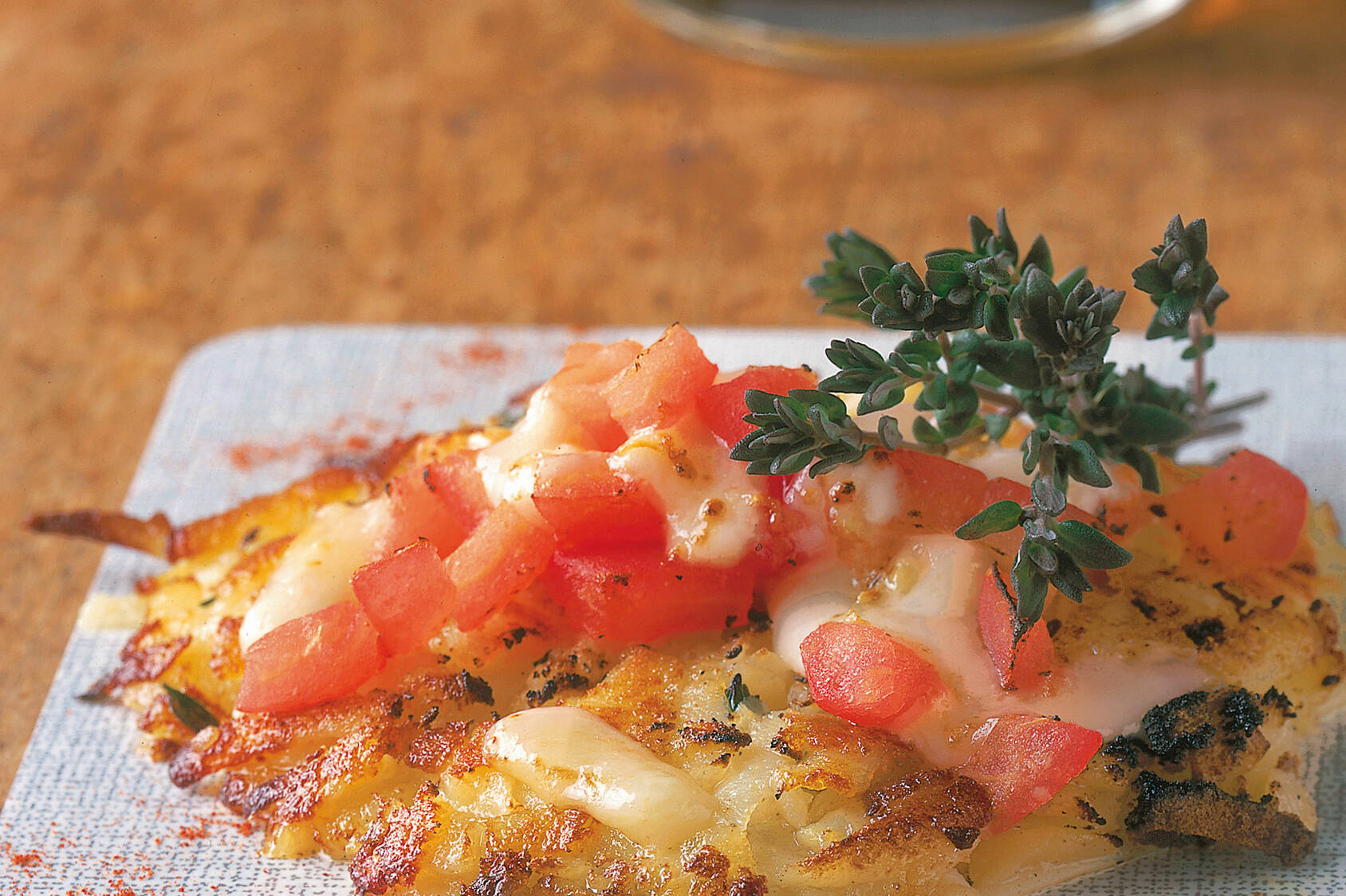 Kartoffelrösti mit Tomaten und Käse Raclette | Küchengötter
