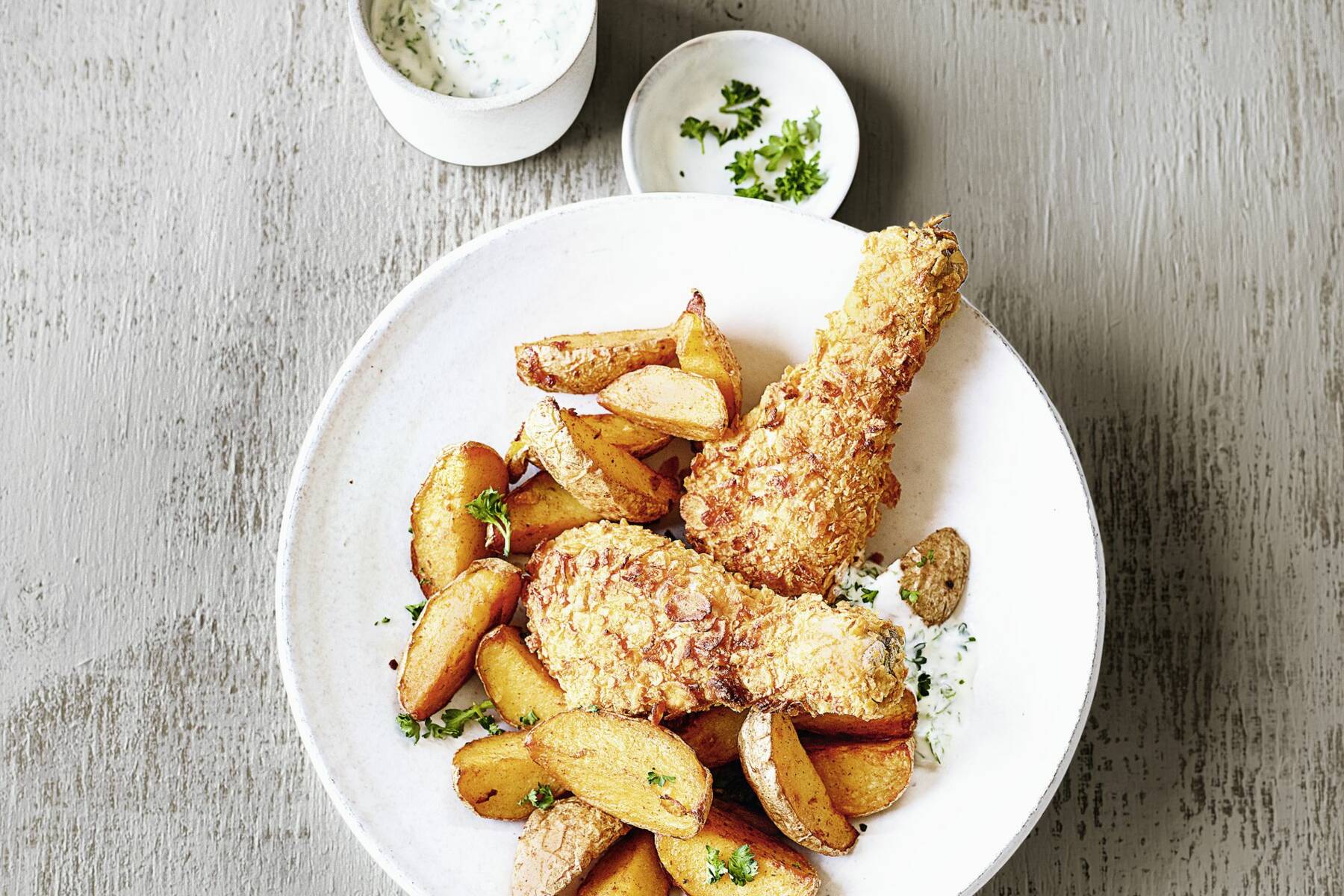 Hähnchenkeulen mit Wedges aus der Heißluftfritteuse Rezept | Küchengötter Hähnchenkeulen mit Wedges aus der Heißluftfritteuse Rezept | Küchengötter