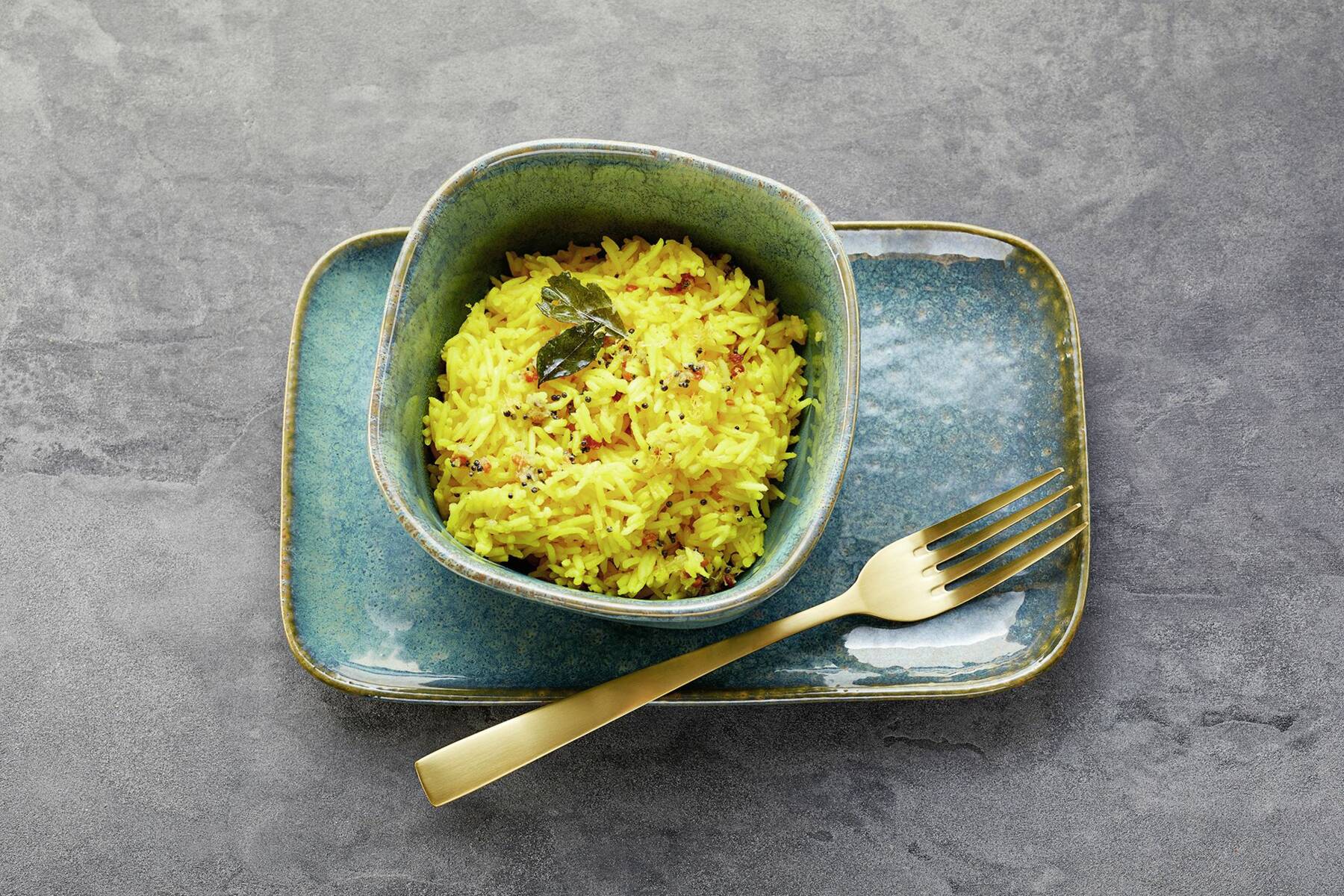 Indischer Zitronen-Reis mit Urad dal Rezept | Küchengötter Indischer Zitronen-Reis mit Urad dal Rezept | Küchengötter