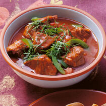 Kalbfleisch in roter Sauce