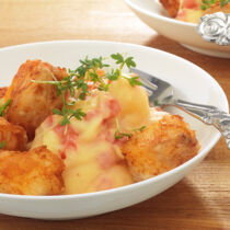 Kartoffel-Tomaten-Püree mit Fisch