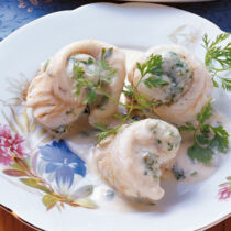 Fischröllchen in Weißweinsauce Fischröllchen in Weißweinsauce