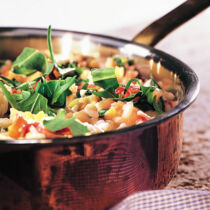 Rucolarisotto mit Schinkenstreifen