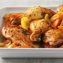 Hähnchenteile auf Safran-Möhren