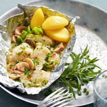 Heilbutt in Folie mit Kräutern und Champignons Heilbutt in Folie mit Kräutern und Champignons