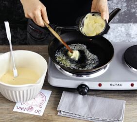 Zubereitung Pfannkuchen - Butter erhitzen