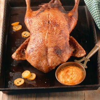 Orangenente mit Kumquats und Kürbispüree Orangenente mit Kumquats und Kürbispüree