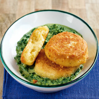 Kartoffeltaler auf Rahmspinat Kartoffeltaler auf Rahmspinat