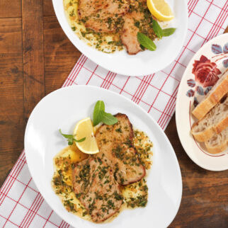 Kalbsschnitzel mit Minzbutter Kalbsschnitzel mit Minzbutter