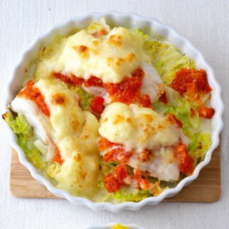 Kabeljau und Wirsing unter gratiniertem Kartoffelstampf Kabeljau und Wirsing unter gratiniertem Kartoffelstampf