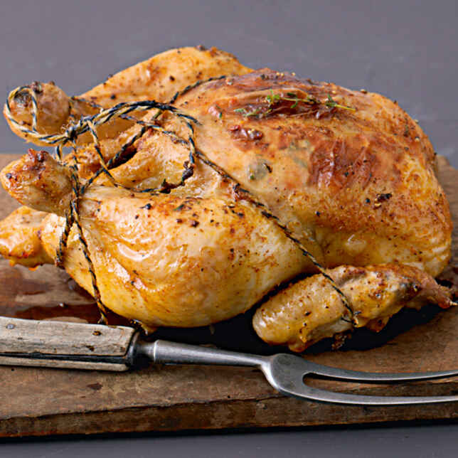 Brathähnchen mit Zitronenfüllung Rezept | Küchengötter Brathähnchen mit Zitronenfüllung Rezept | Küchengötter