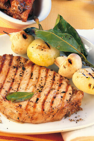 Schweinesteaks mit Champignons Schweinesteaks mit Champignons