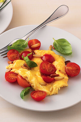 Rührei mit Tomaten und Basilikum Rührei mit Tomaten und Basilikum