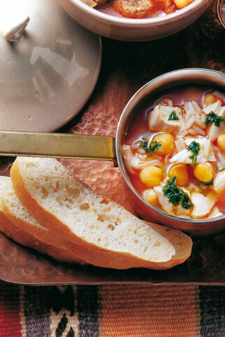 Hühnersuppe mit Reis und Kichererbsen Hühnersuppe mit Reis und Kichererbsen
