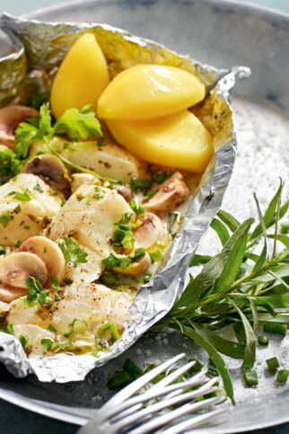 Heilbutt in Folie mit Kräutern und Champignons Heilbutt in Folie mit Kräutern und Champignons