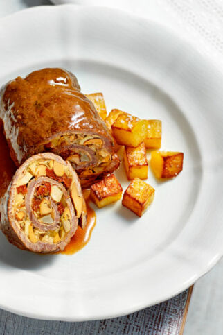 Rinderrouladen mit Schinken und Pilzen Rinderrouladen mit Schinken und Pilzen