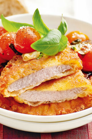 Parmesanschnitzel mit Schmortomaten Parmesanschnitzel mit Schmortomaten