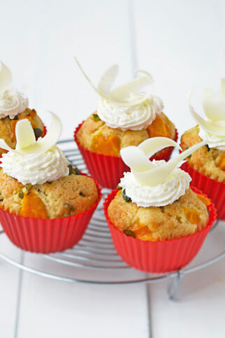 Mango-Cupcakes mit weißer Schokolade Mango-Cupcakes mit weißer Schokolade