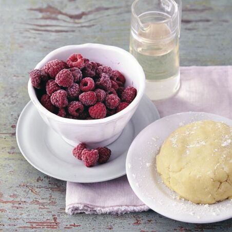 Hugo-Cheesecake mit Himbeeren Hugo-Cheesecake mit Himbeeren