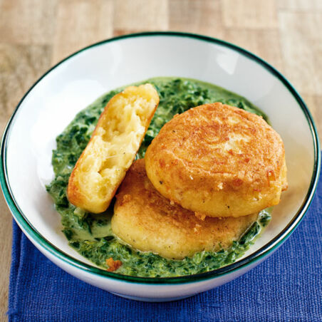 Kartoffeltaler auf Rahmspinat Kartoffeltaler auf Rahmspinat