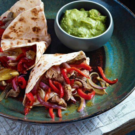 Beef-Fajitas mit Paprika und Zwiebeln Beef-Fajitas mit Paprika und Zwiebeln